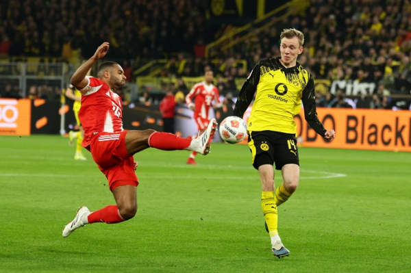 Bayern comeback dents Dortmund's Bundesliga title hopes Bayern comeback dents Dortmund's Bundesliga title hopes