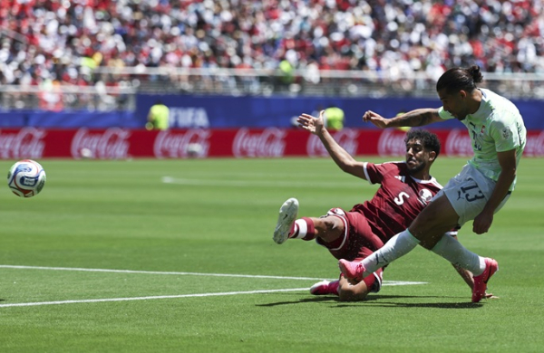 Khoukhi's late strike helps Qatar secure 1st ever WC point Khoukhi's late strike helps Qatar secure 1st ever WC point